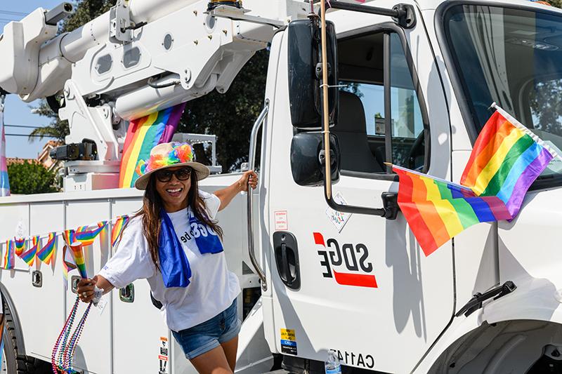 A team member celebrates during the 2022 San Diego Pride parade